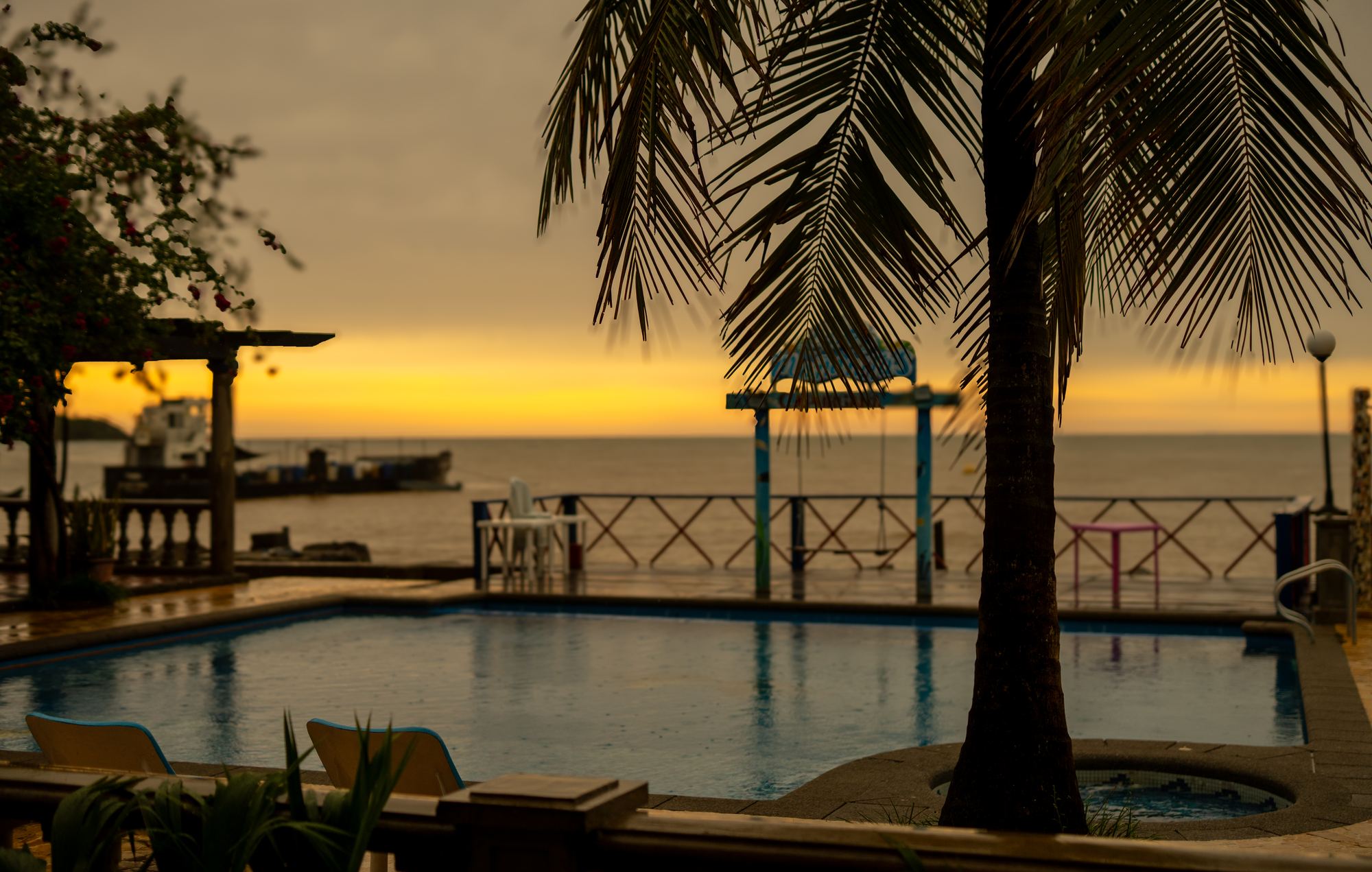 The pool at sunset, facing the Caribbean